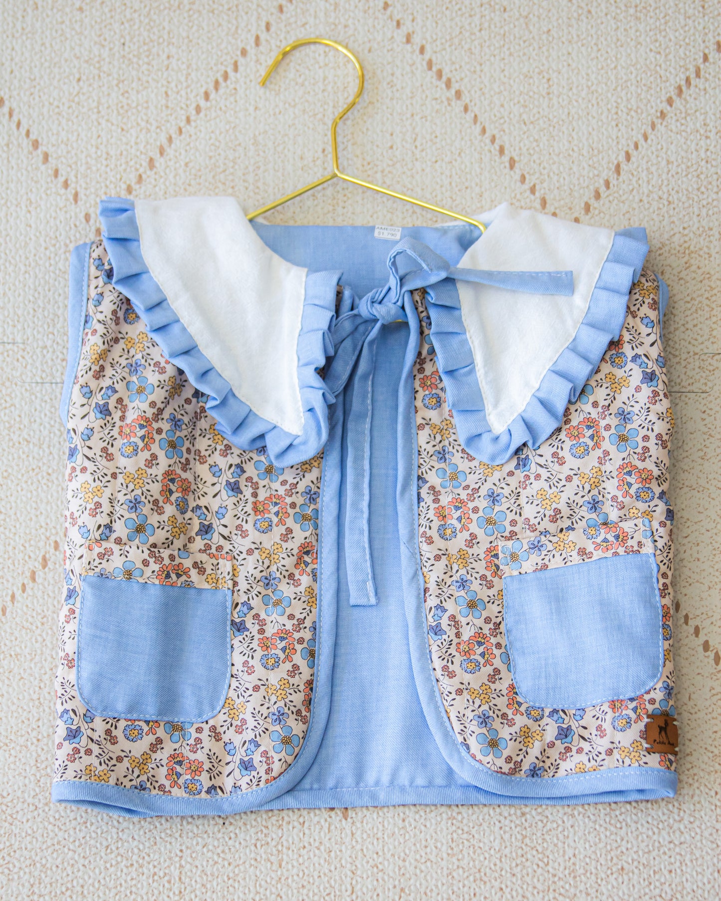 Chaleco capitoneado reversible con cuello