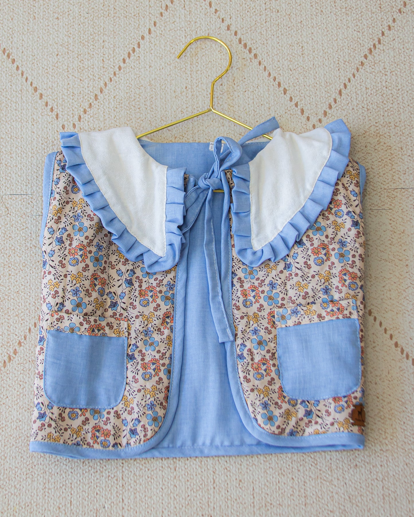 Chaleco capitoneado reversible con cuello